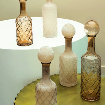 cianna brown glass bottle round with bal l