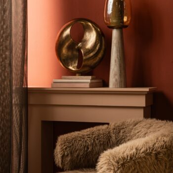 deuie brass casted alu statue travertine base